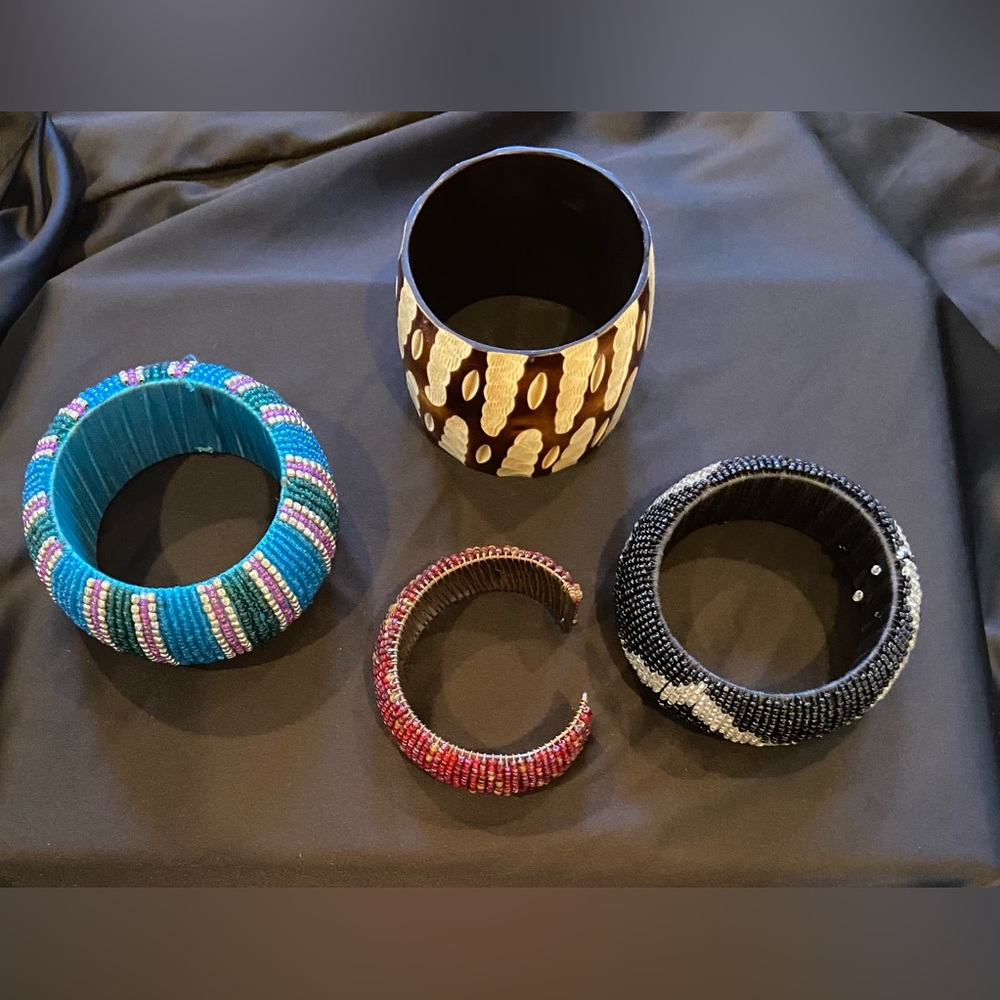Bundle of 4 bangle bracelets